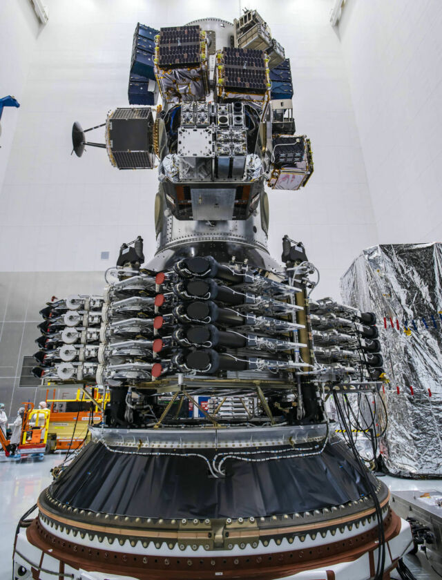 Starlink satellites before launch.  The black circles in the middle are the laser links.
