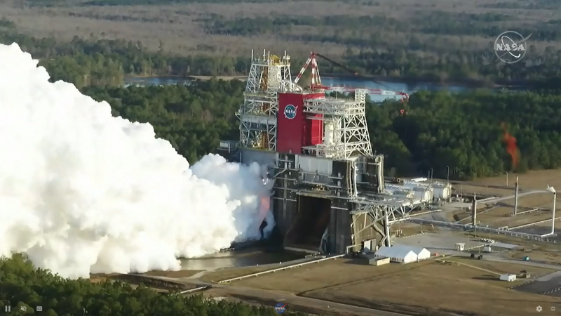 A huge cloud of smoke or steam poured out from the multi-story test platform.